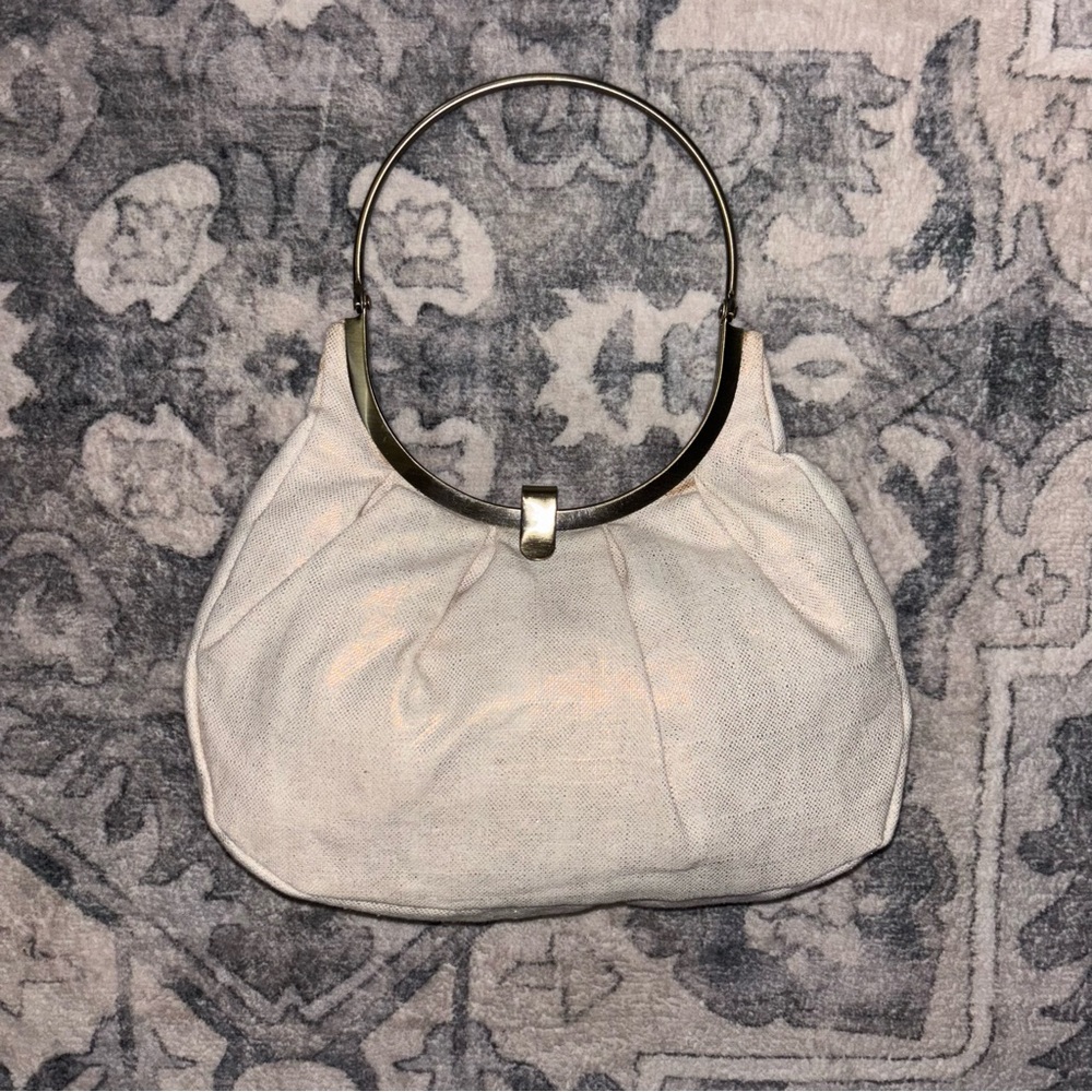 Elegant Cream Handbag with metal Handle